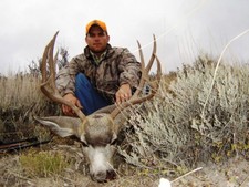 Chad Justus shown here with a nice mule deer buck taken during the early October deer season.