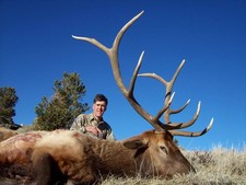 Another good picture of a good bull elk taken with Bar-Nunn Hunting.  Peter Linsay of Laramie booked this hunt after Tom Gebbie gave up his annual spot after taking his trophy bull in 2006.