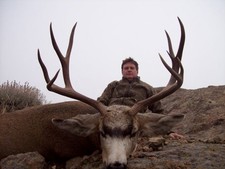 Mark Nethery shown here with another trophy mule deer.  2008 was a great year for big deer.