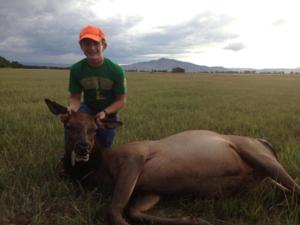 <p>Bar-Nunn's very own Garrett Nunn with the first elk of the season. Garrett was able to shoot this river bottom cow on the evening of Sept 9th, 2013.</p>