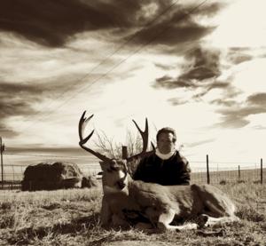 <p>Mark with his 2013 Wyoming Mule Deer. Mark also took a very nice <a href=